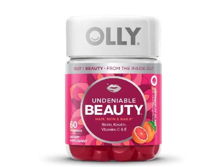 Bottle of Olly gummy hair, skin and nail vitamins.