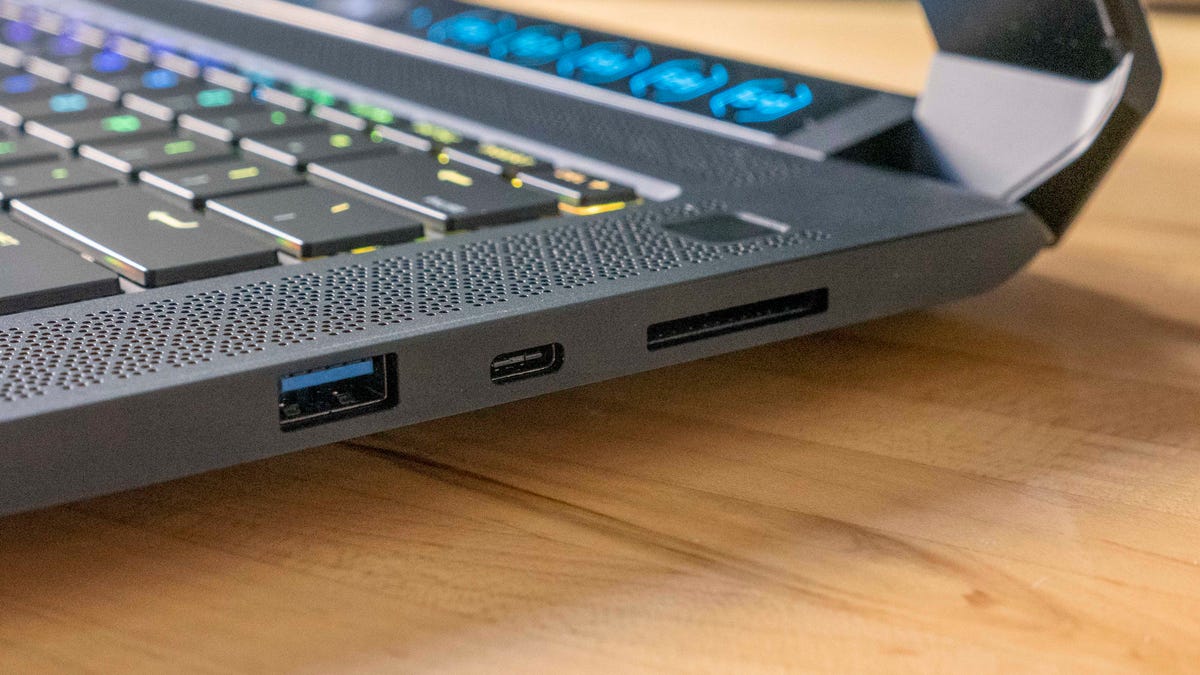 Close-up of the Corsair Voyager a1600 USB-A, USB-C ports and SD card slot on the right side of the laptop.