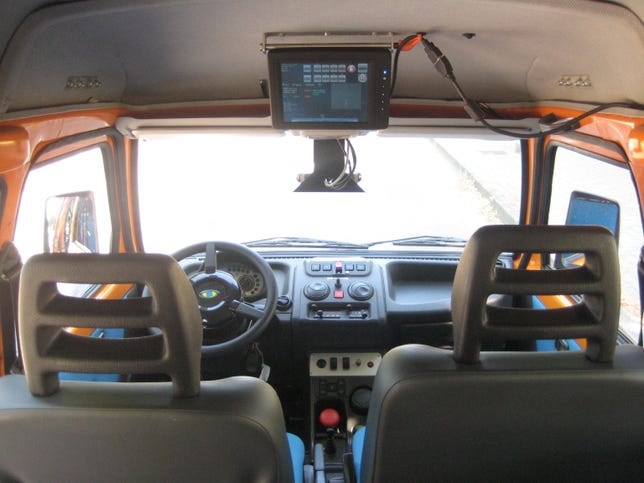 Interior of an autonomous Piaggio Porter Electric van.
