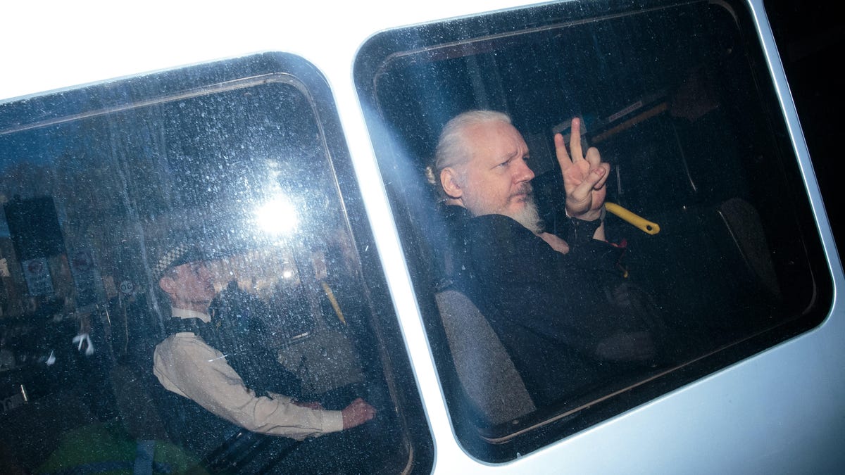Julian Assange in transport after his arrest