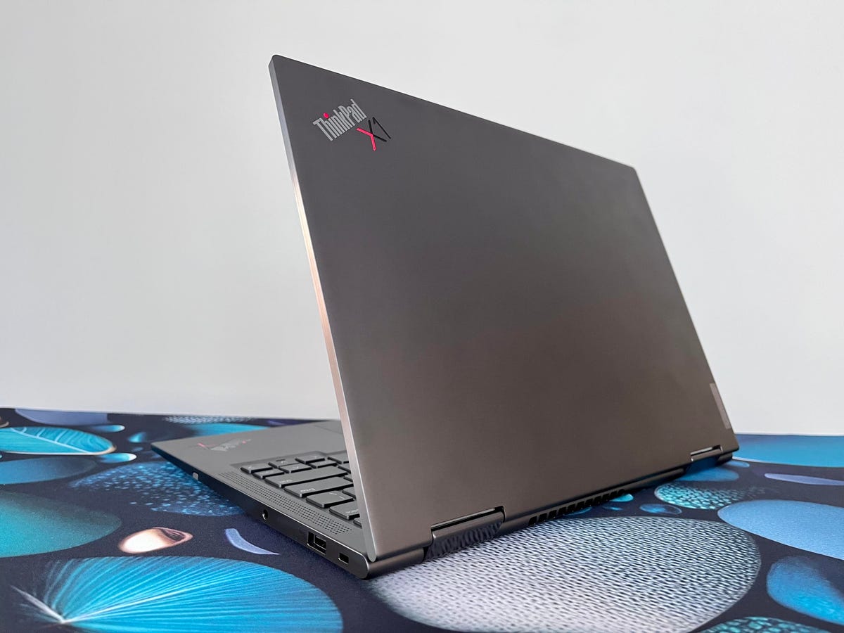 Lenovo ThinkPad X1 Yoga Gen 8 turned to show dark gray lid and logo