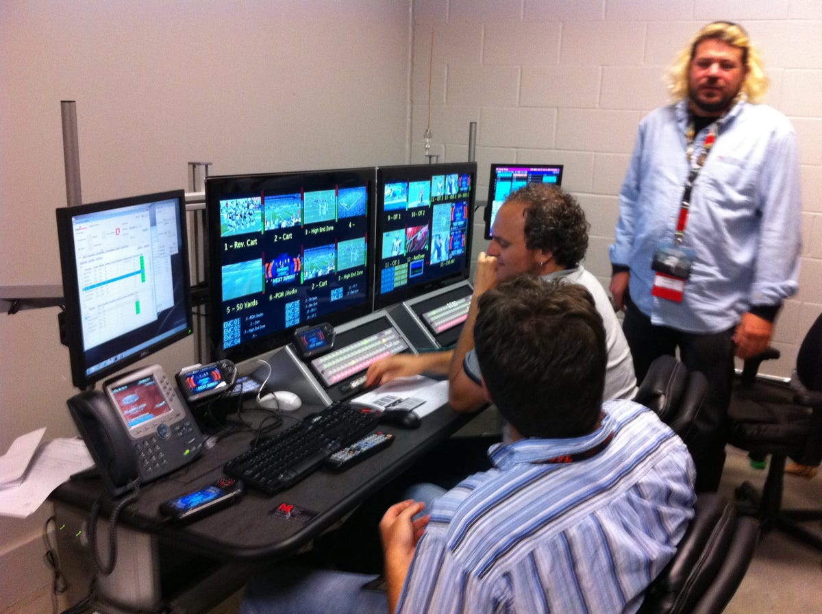 FanVision's tiny but dense nerve center, where feeds and replays are selected.