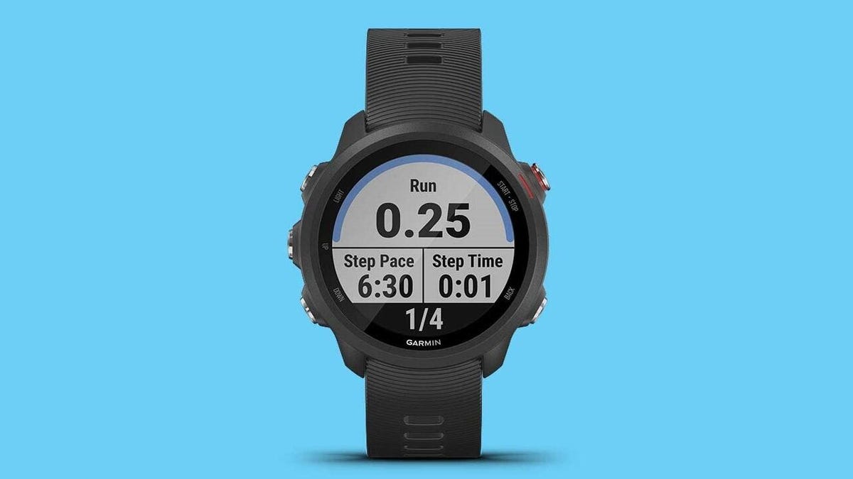 A front view of a Garmin 245 fitness tracker against a light blue background.