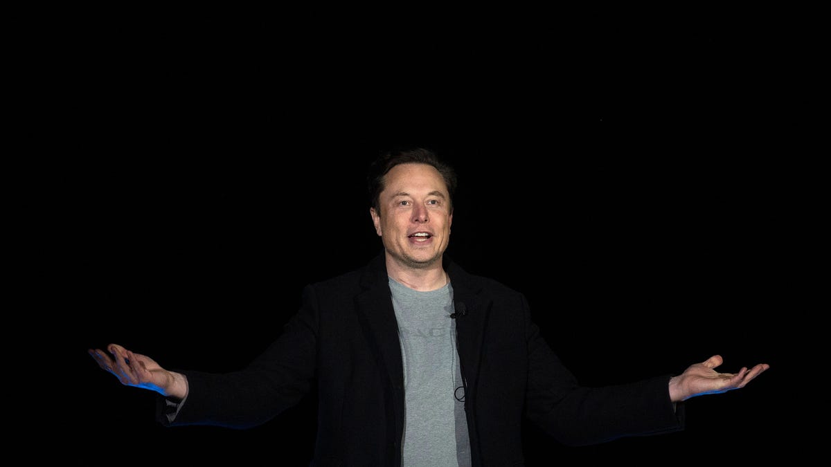 Elon Musk speaks during a press conference at SpaceX's Starbase facility in Texas