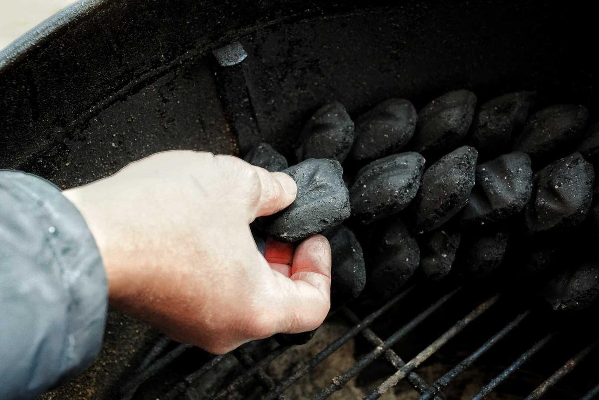 charcoal briquettes on grill