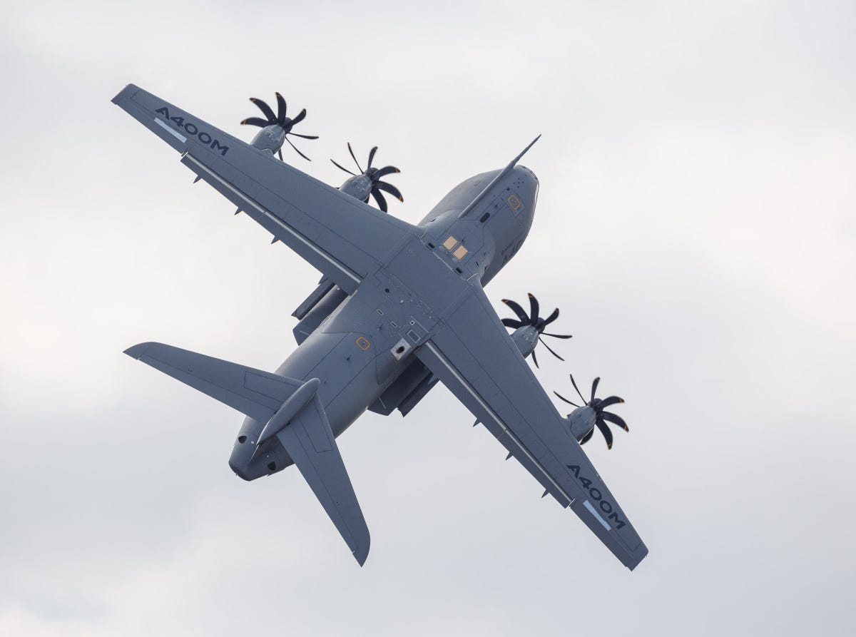 ​The A400M can carry up to 37 tons of cargo, including trucks or two helicopters. But when it's empty, as in this moment after takeoff over the Farnborough International Airshow, it can ascend steeply.
