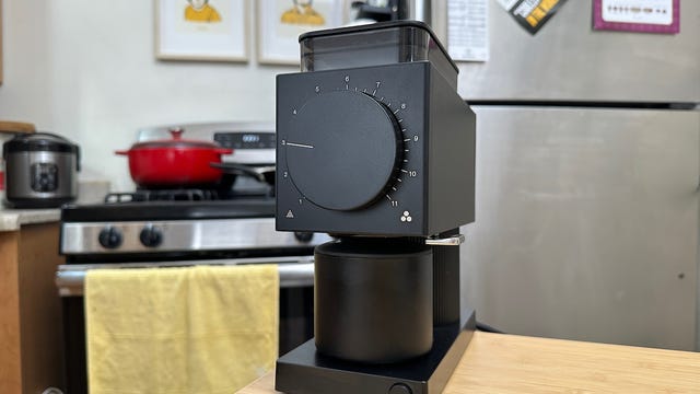 A coffee grinder on a kitchen island