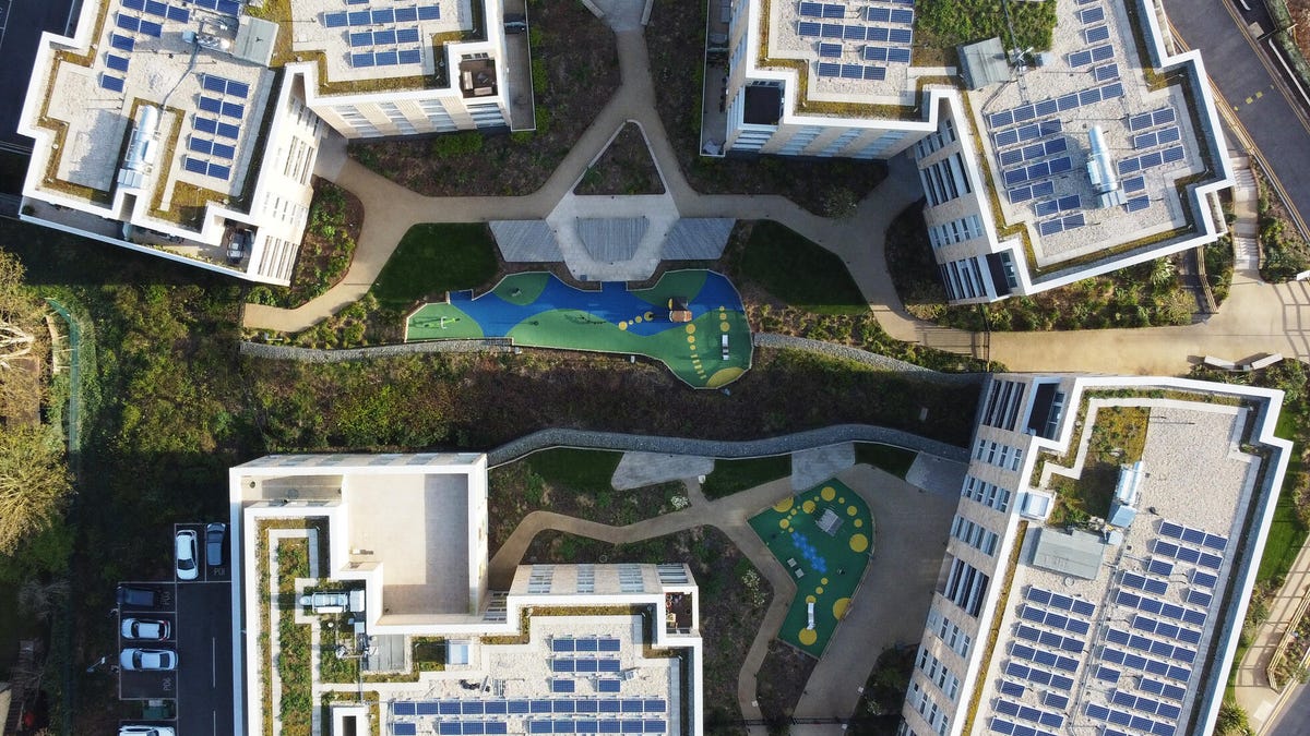 solar panels on the roof of an apartment