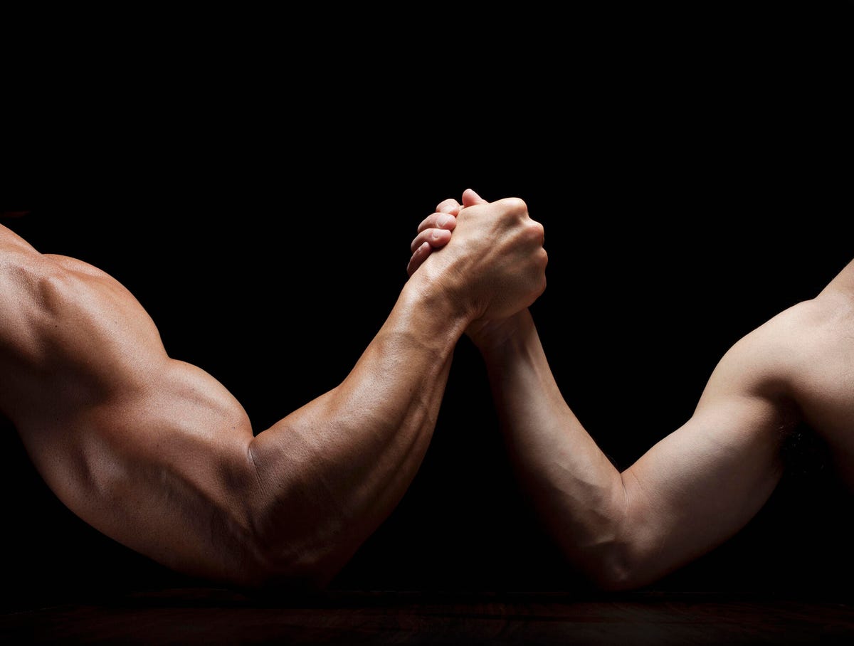 Two men arm wrestling