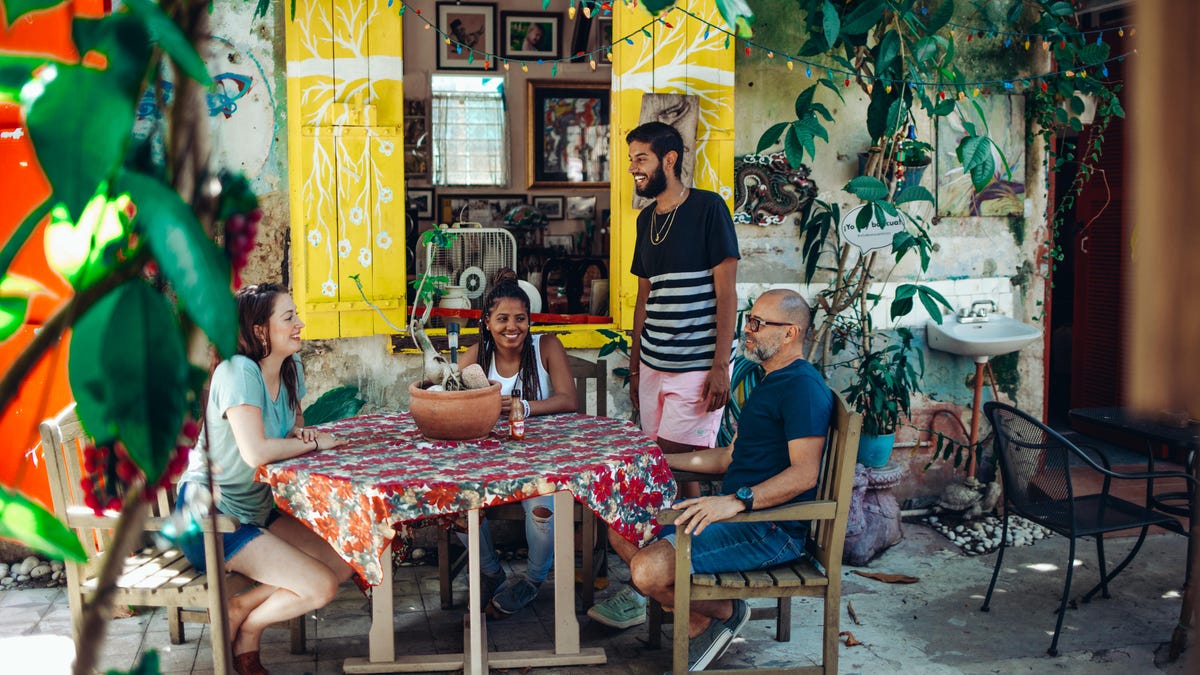 Tourists at an outdoor cafe in Puerto Rico.