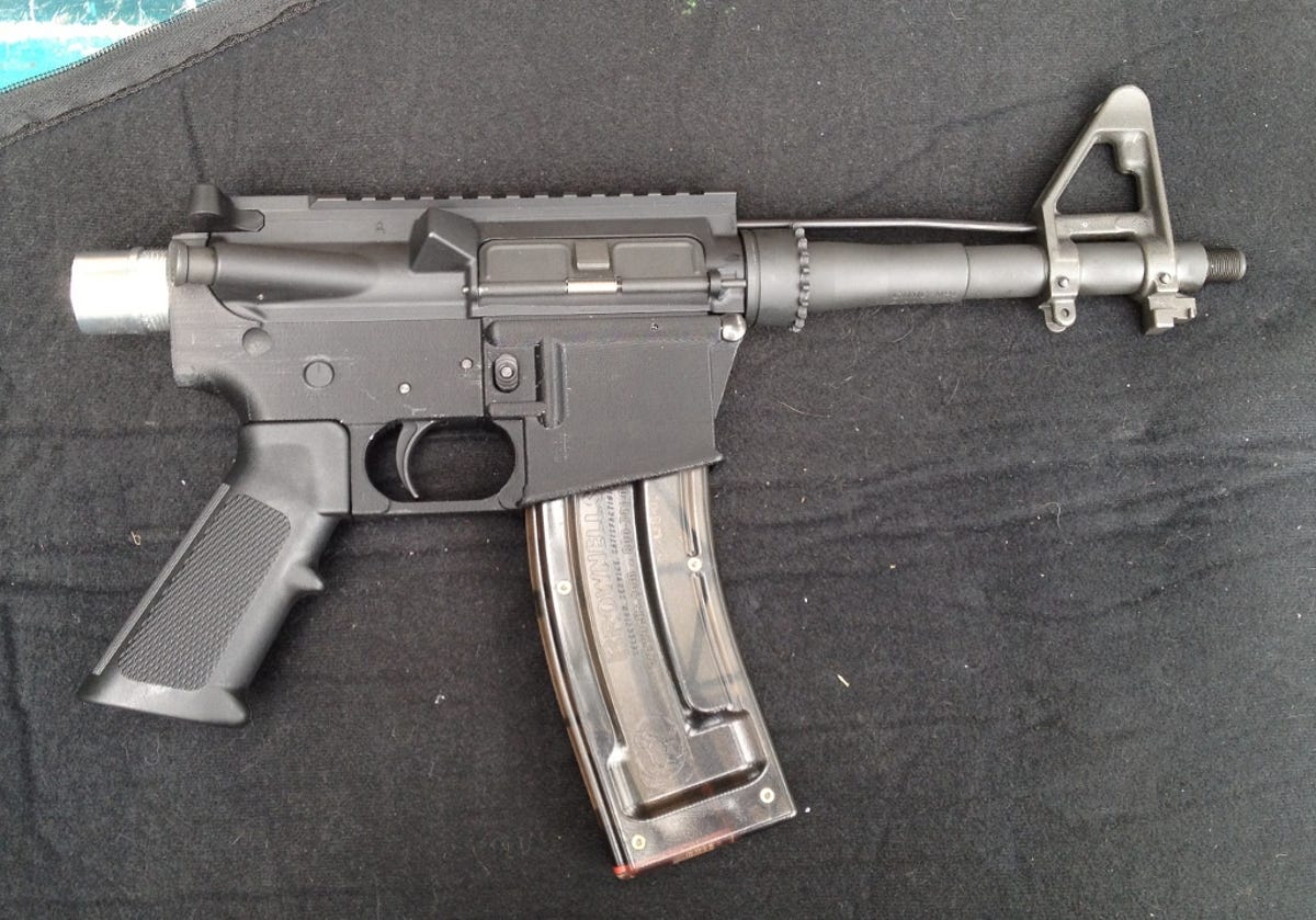 Michael Guslick's homemade pistol, with a plastic, 3D-printed lower receiver designed for an AR 15 hunting rifle.