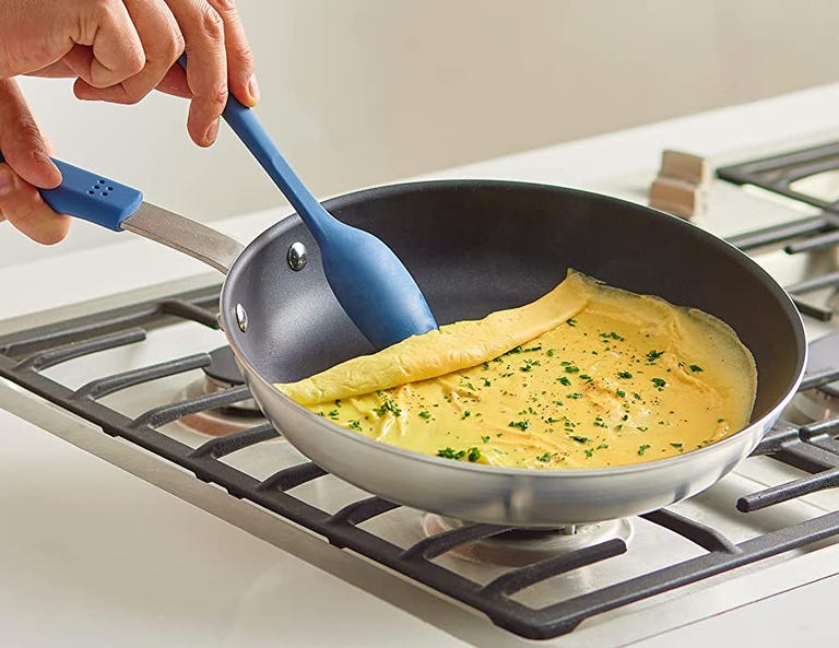 misen nonstick pan on range cooking eggs