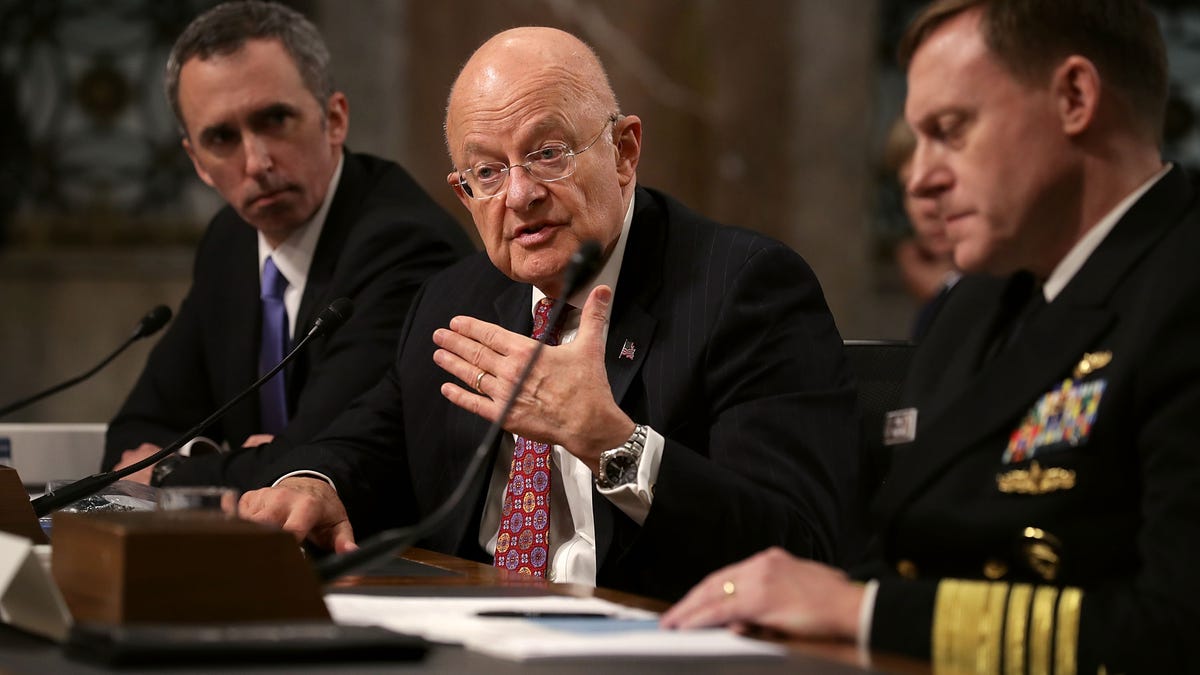 Director of National Intelligence James Clapper (center) testifies before the Senate Armed Services Committee on Thursday.