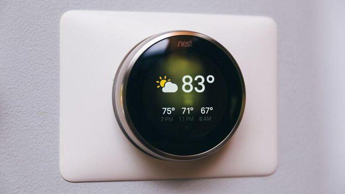 A Nest thermostat with a reading of 83 degrees