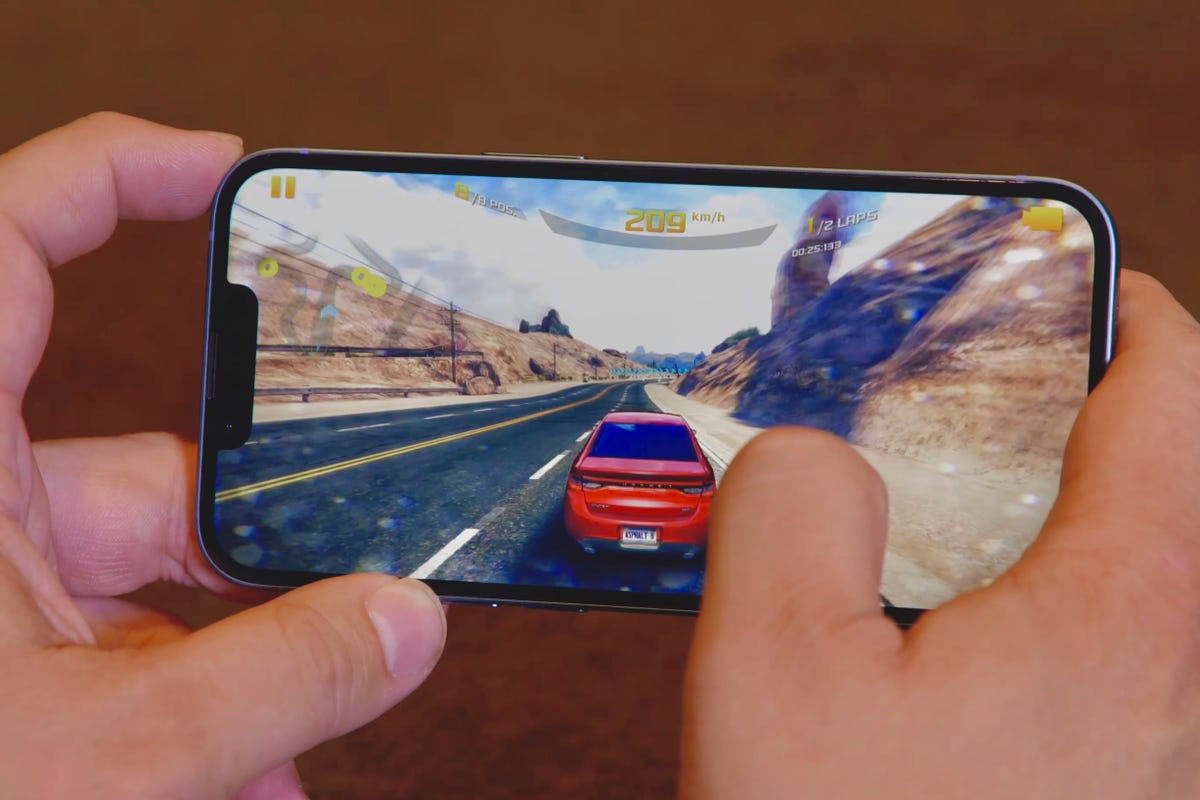 Someone playing a video game on the iPhone