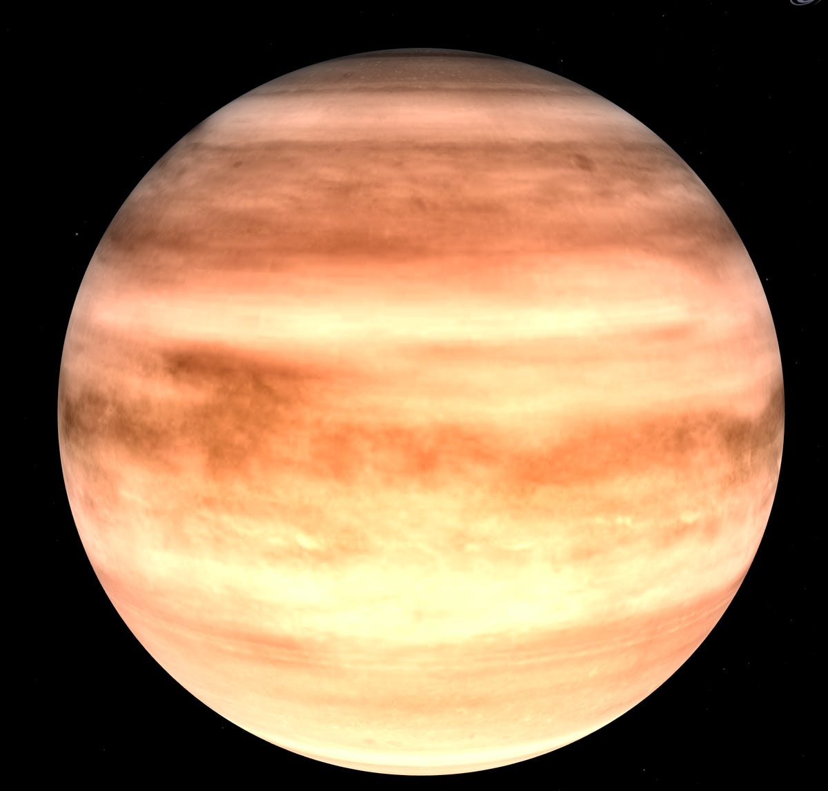 A depiction of WASP-96b, a gas giant with orange stripes and beige wisps.