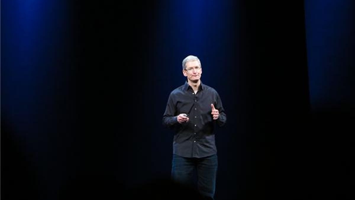 Tim Cook on stage at WWDC 2013