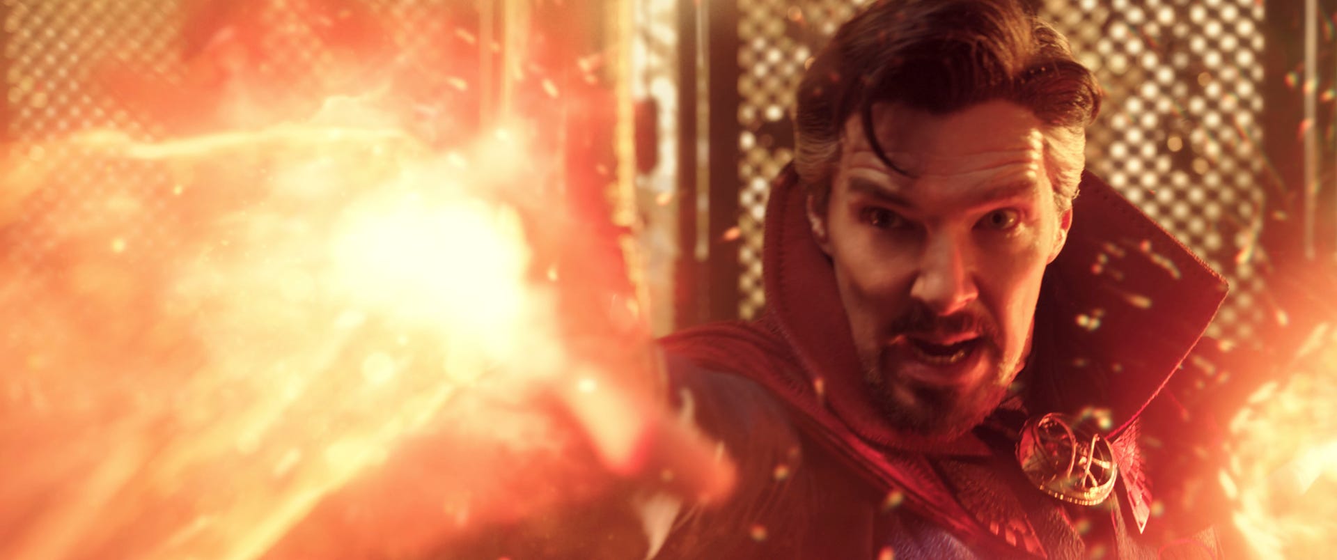 Benedict Cumberbatch shoots magic light from his hands in Marvel's Doctor Strange in the Multiverse of Madness.