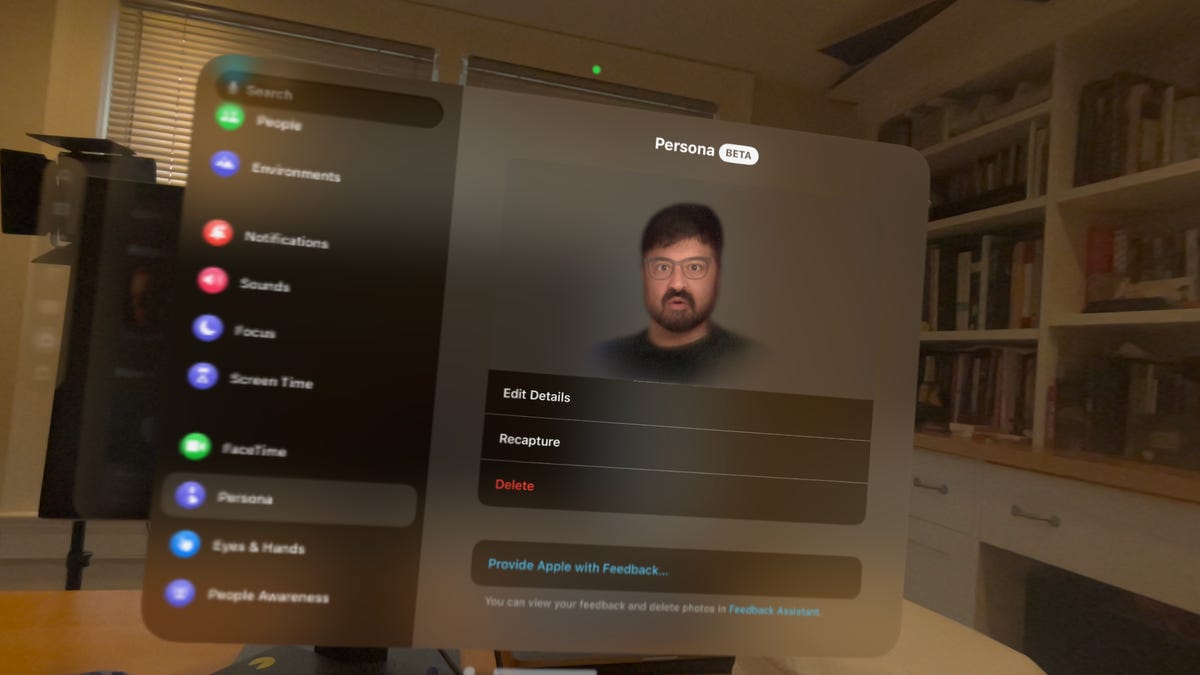 A virtual face floating in a menu hovering in a room.