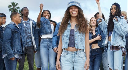 male and female models wearing american eagle jeans