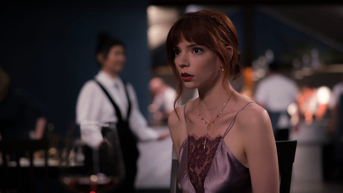 Anya Taylor-Joy looks stunned in an image from The Menu.