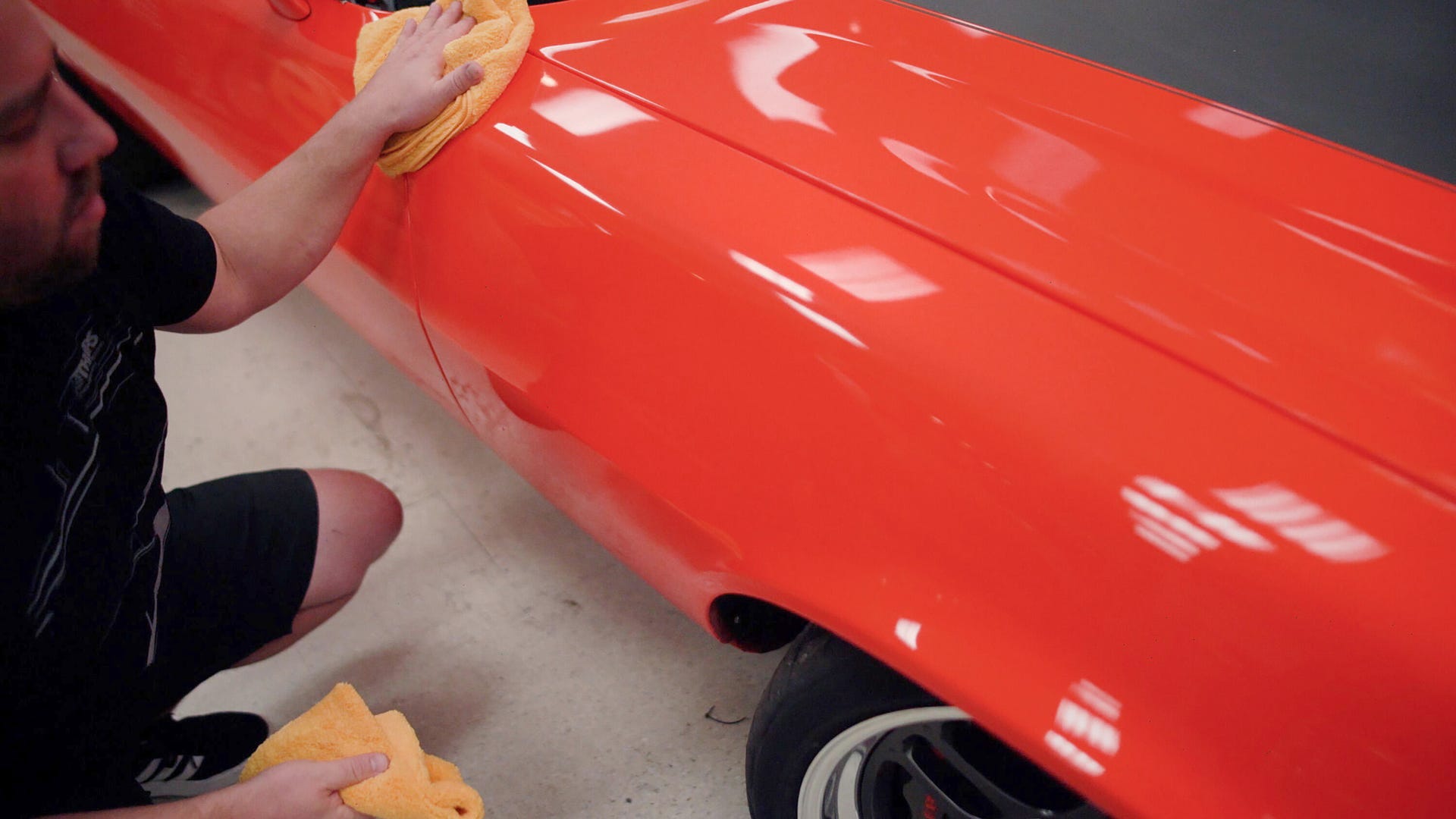 Mothers Ceramic Detailer being applied to a red classic car