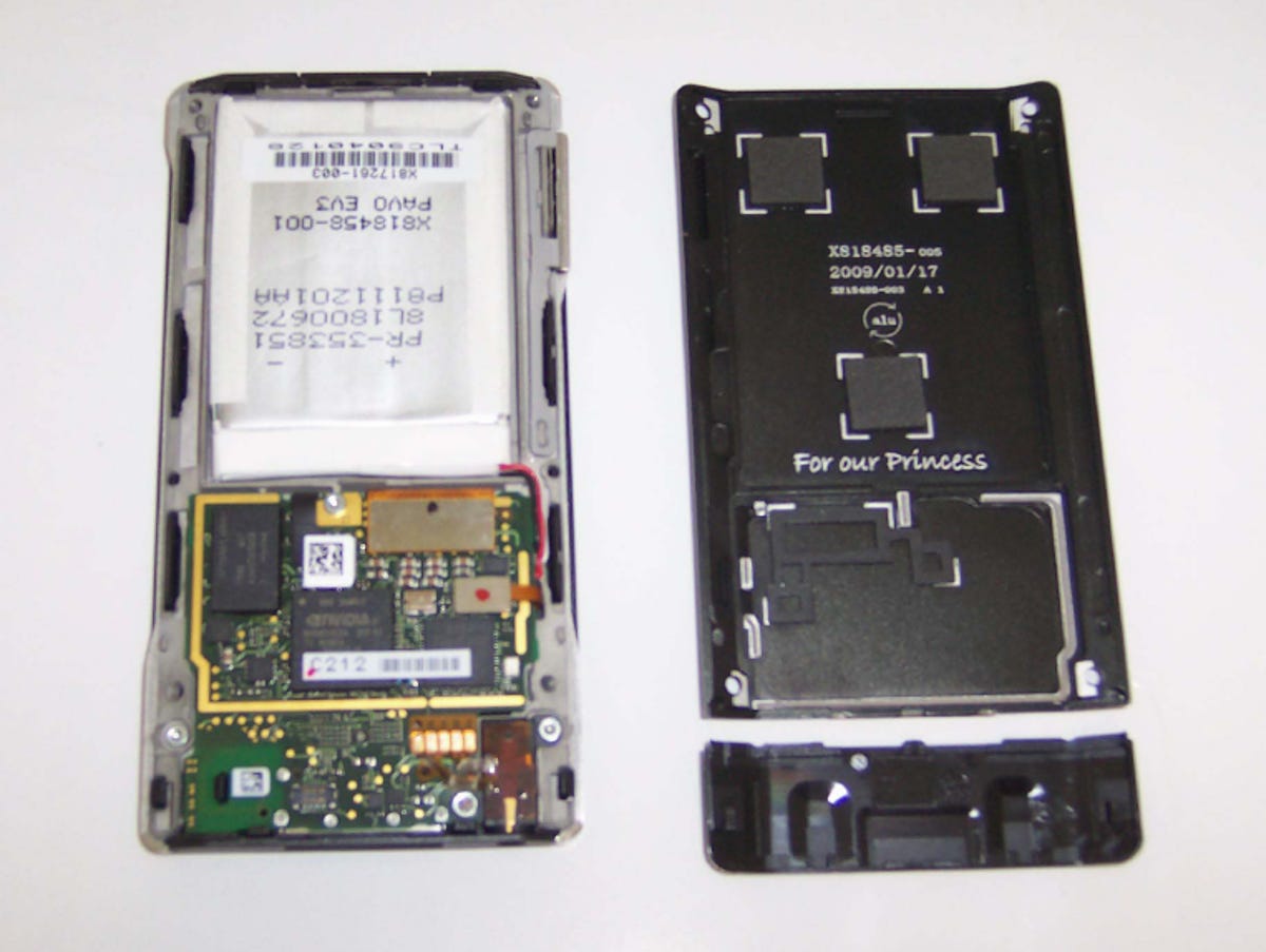 Photo of Zune HD open with components showing.
