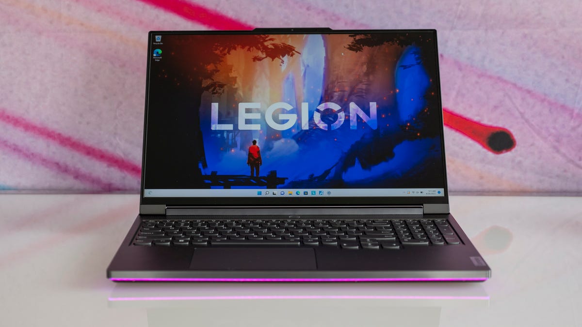 Lenovo Legion 7 Gen 7 laptop open on a table with an abstract background