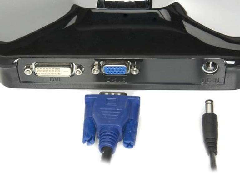 The AOC E2243's ports are conveniently located in its base.