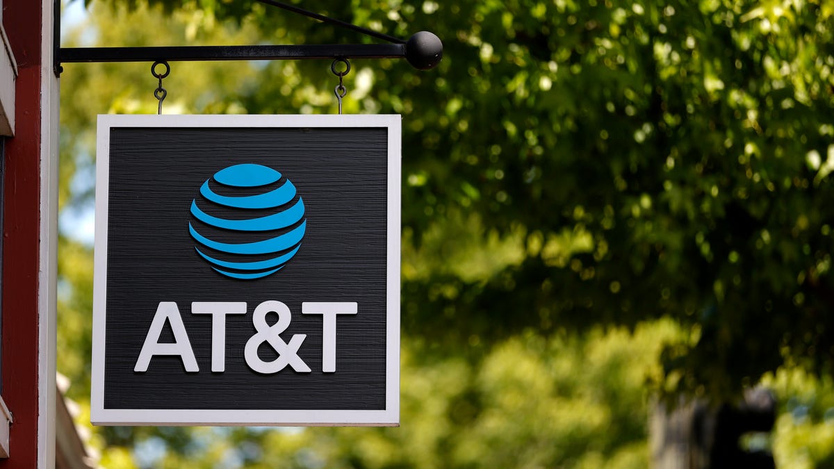 Sign for an AT&T store showing the name and logo.
