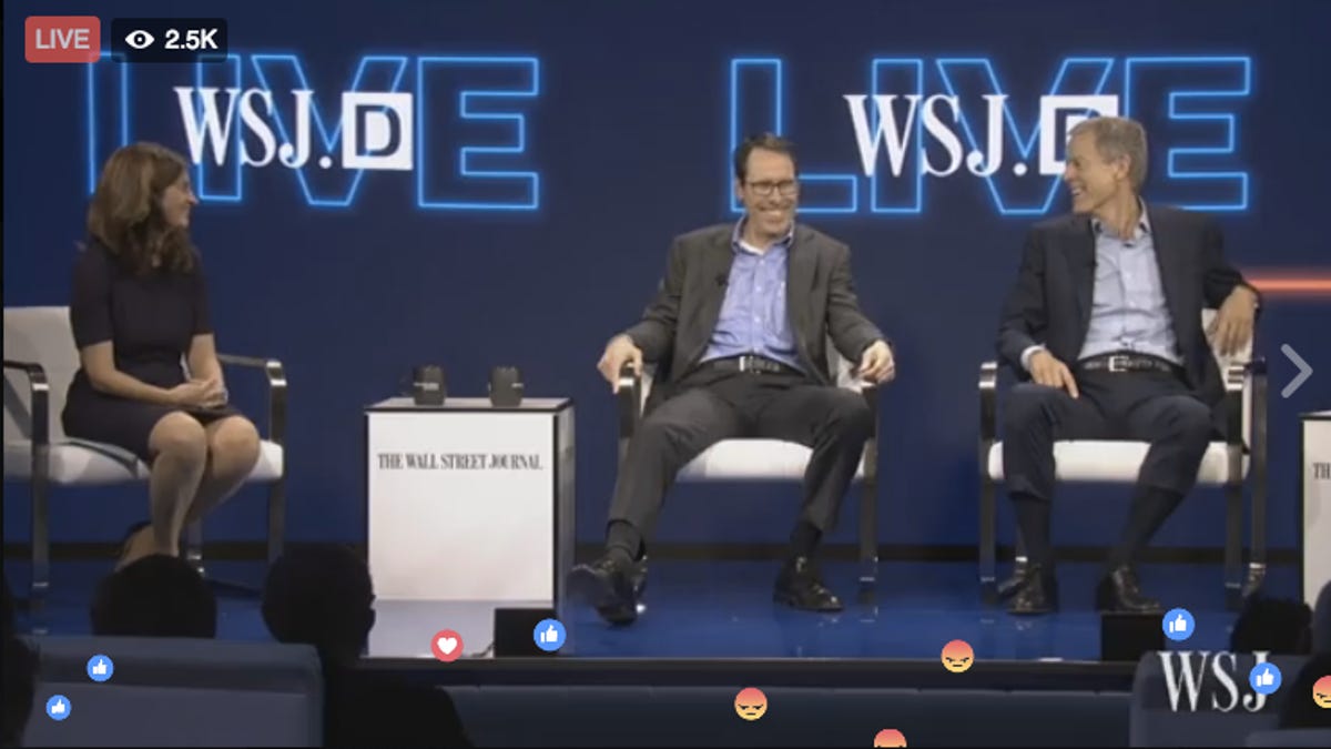 AT&T CEO Randall Stephenson (center) and Time Warner CEO Jeff Bewkes were on stage together at the WSJ.D conference in California to talk about their newly announced $85.4 billion merger.