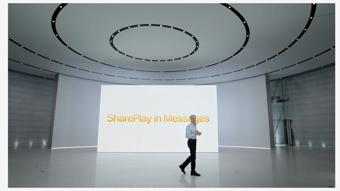 Craig Federighi introduces SharePlay in Messages in front of a giant screen