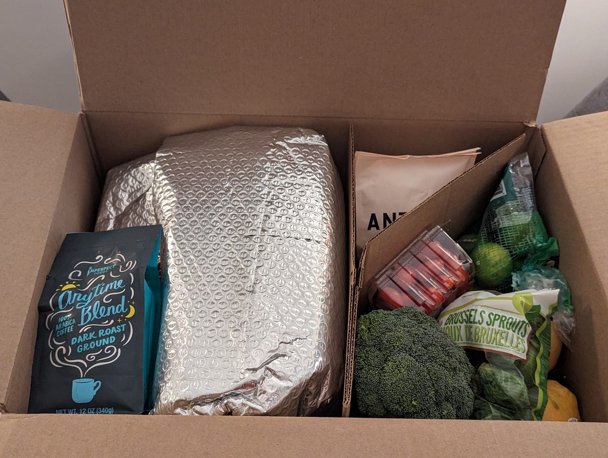 various groceries in delivery box