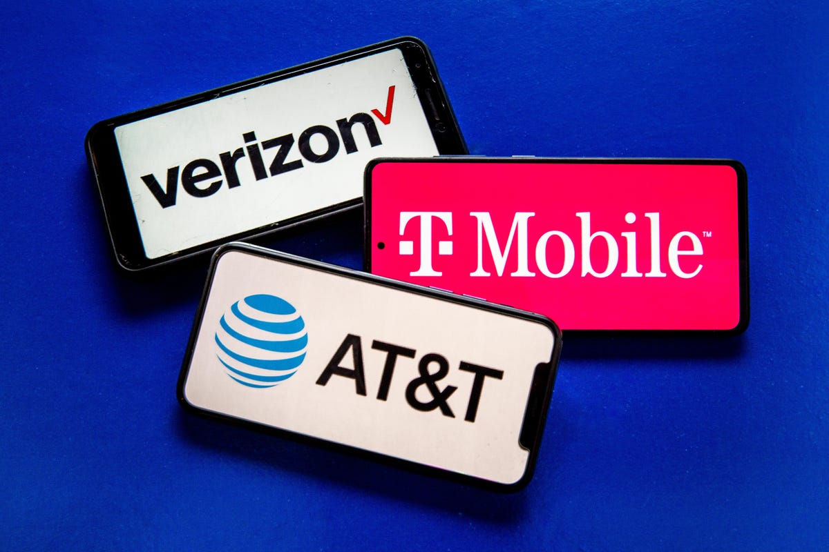 Verizon, AT&T and T-Mobile logos on smartphone screens
