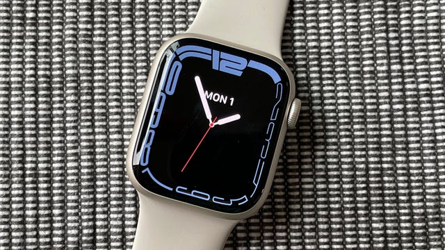 The Apple Watch Series 7 with a white strap.