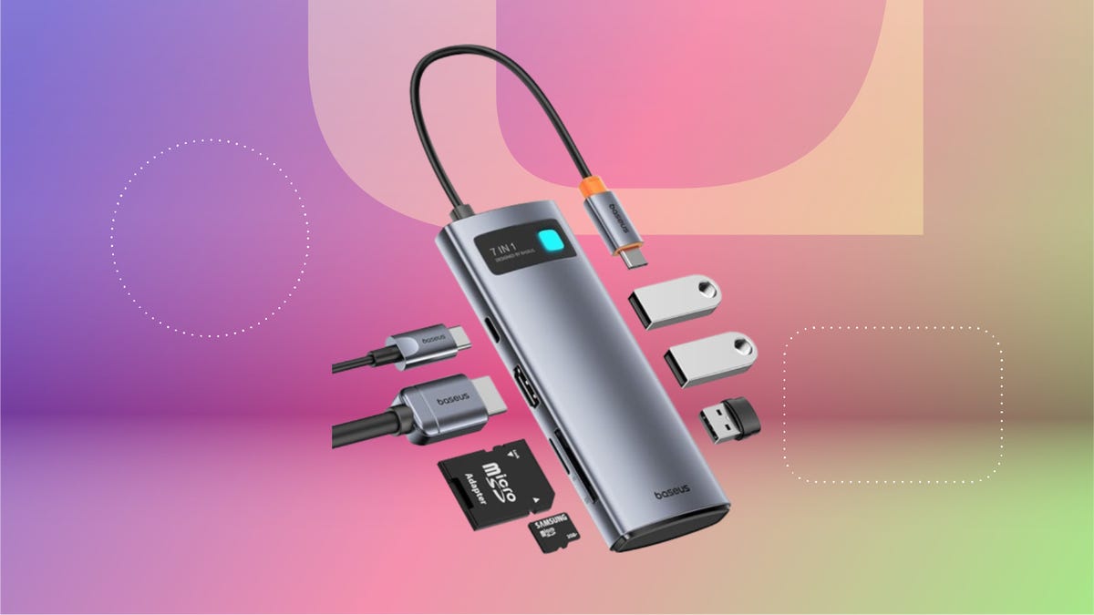 baseus-usb-c-hub with various items going into the ports against a colorful gradient background