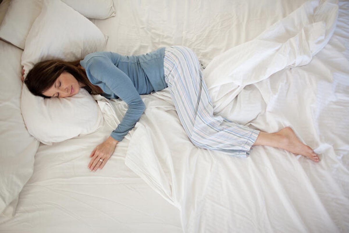 Woman sleeping successful  bed