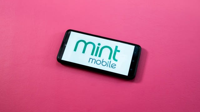 Mint Mobile logo on a phone on a pink background
