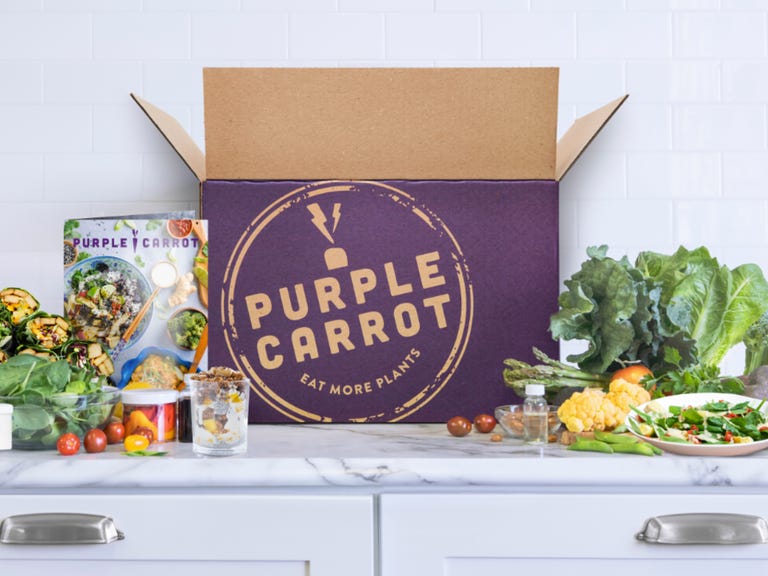 purple carrot meal kit on table next to box
