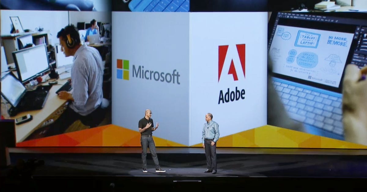 Microsoft CEO Satya Nadella, left, announces a development partnership with ally and Adobe CEO Shantanu Narayen at Adobe's Max conference.