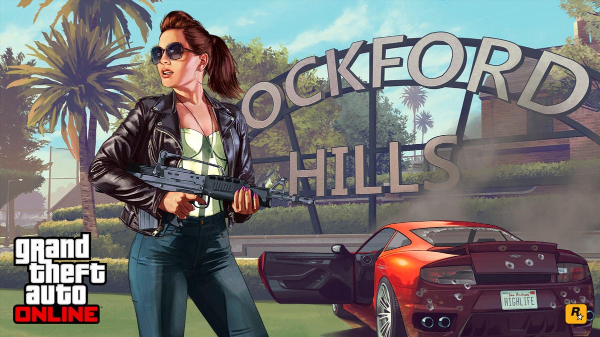 A women holds a machine gun in front of a sign and a sports car with its door open