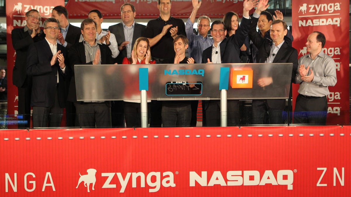 Zynga CEO Mark Pincus (middle), along with his wife Alison and Zynga executives ringing the bell this morning.