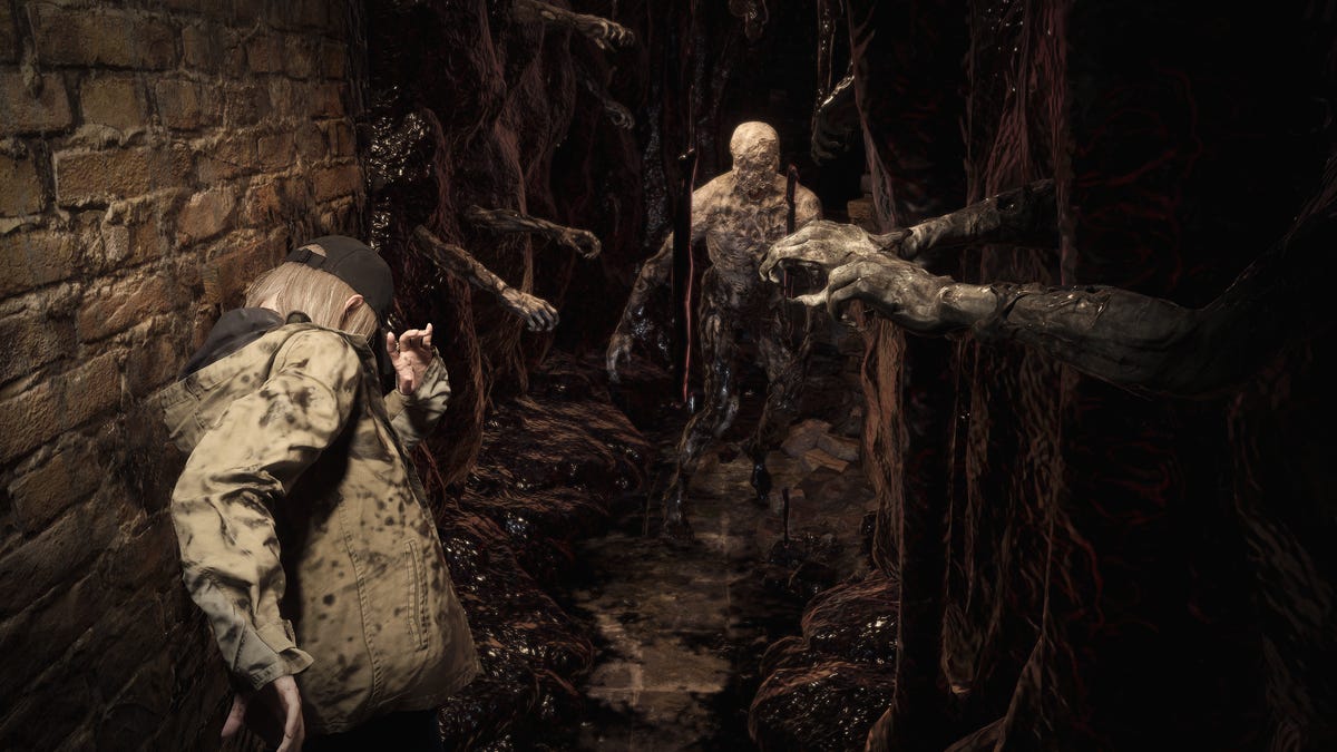 Rose Winters covers her face as enemies reach for her in Resident Evil Village