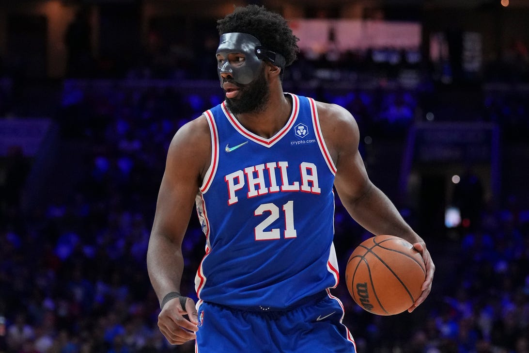 Sixers star Joel Embiid wears a face mask in Game 3.