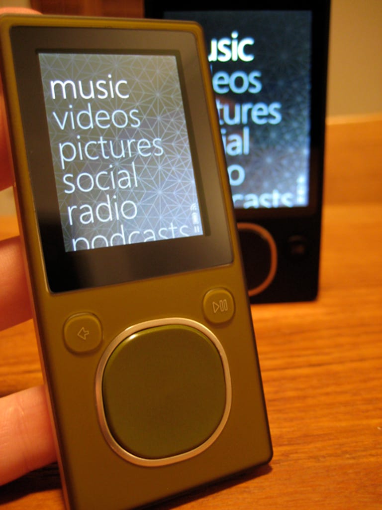 Photo of Zune 8 in front of Zune 80.