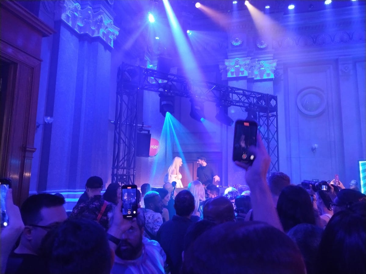 Kim Petras on stage at Motorola's event.