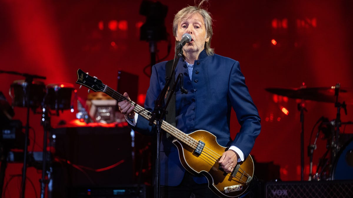 Paul McCartney performs on stage
