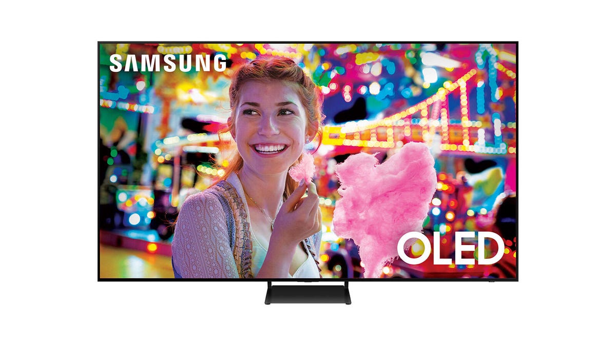 An 83-inch Samsung S90C QD-OLED TV with an image of a smiling woman.