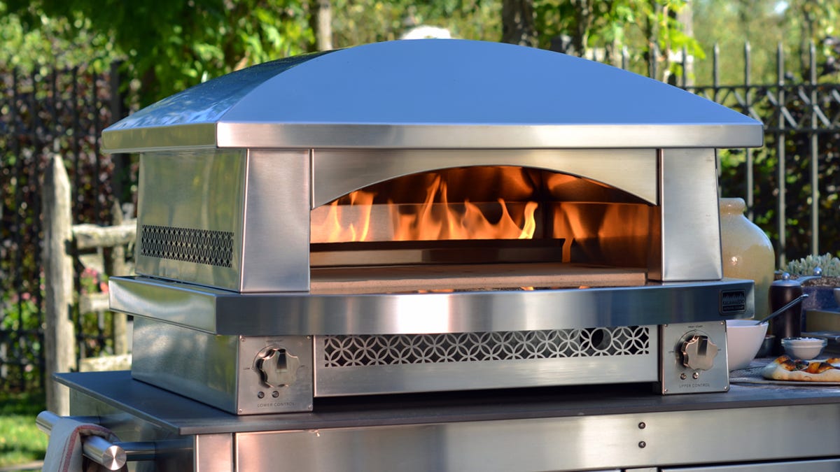 The Kalamazoo Outdoor Gourmet Artisan Fire Pizza Oven is like having your own pizzeria in the back yard.