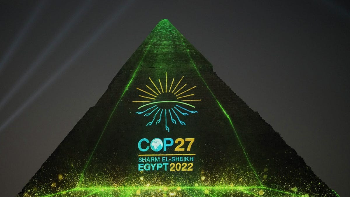 The Egyptian Pyramids illuminated with COP27 logo